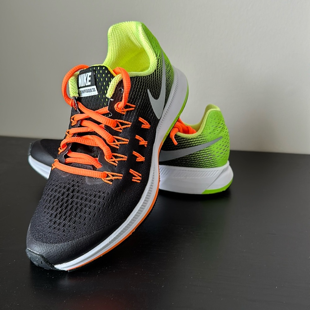 Brand New Nike Pegasus 33 running shoes.  This is a Big Kid’s size 4.5Y.